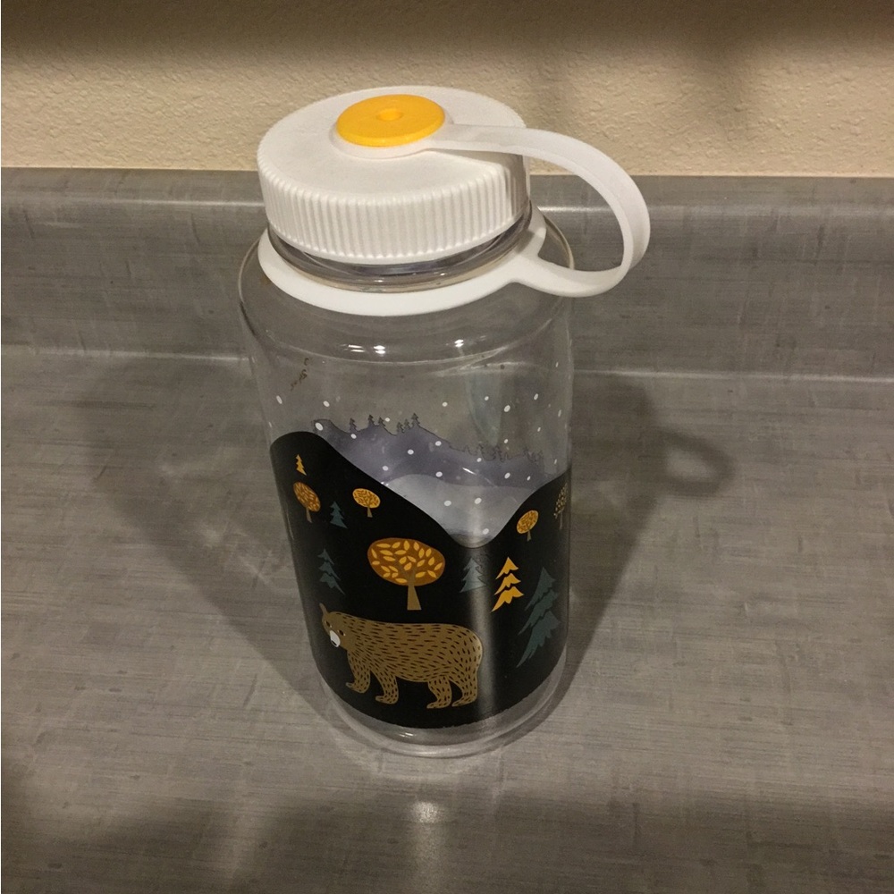REI Black and Gold Bear Design Water Bottle